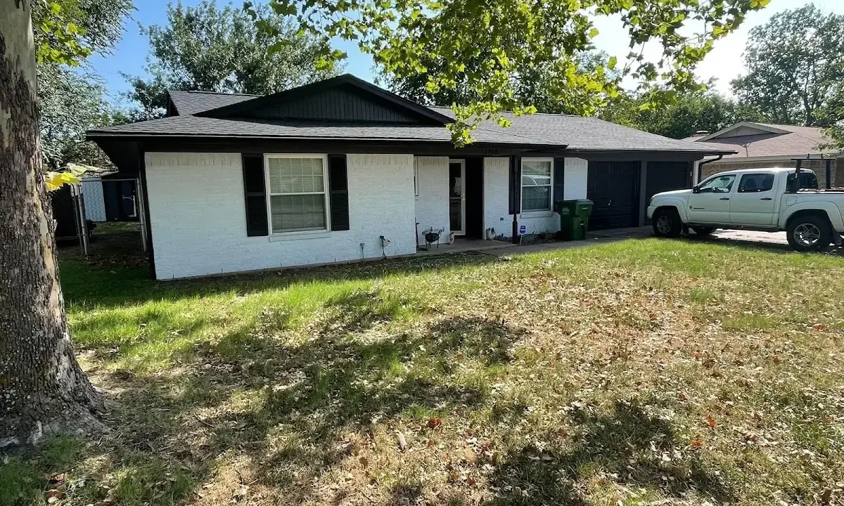 Professional roofing crew working on a residential roof in Middle Paxton